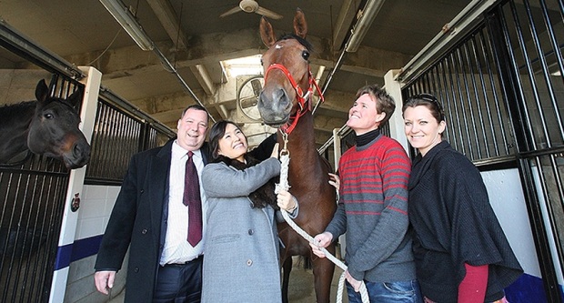 Joe Dallao (left) with his wife Young Sook at the Busan Racecourse stables with Bart and Pam Rice (Pic: Hankyoreh)